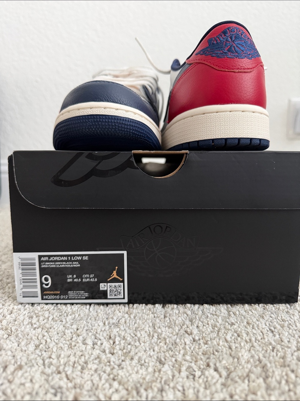 Nike Air Jordan Low SE in Navy, Red, and Cream